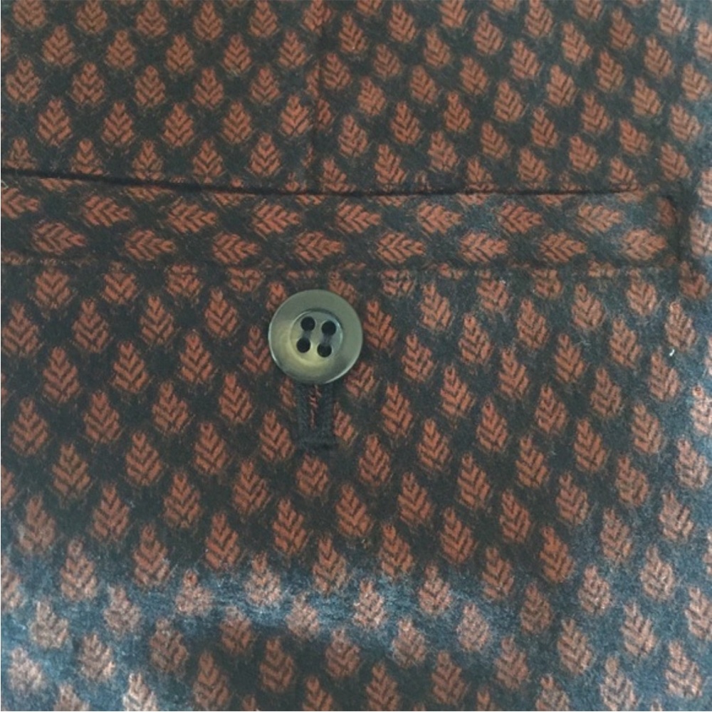 Beautiful Anthropologie black and dark rust pants